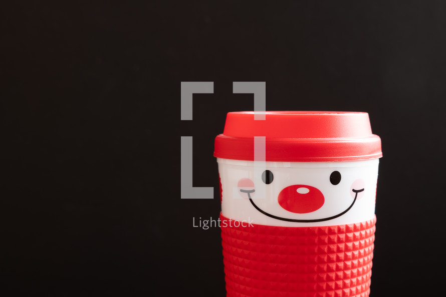 Happy snowman mug on black background