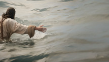 Jesus reaching out in the water