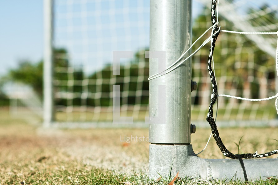 Close up of soccer goal in park.