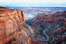 The road winds up to the Colorado National Monument outside of the Colorado National Monument