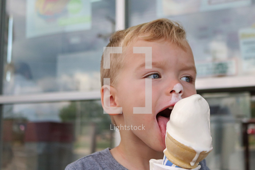 a boy eating ice cream 