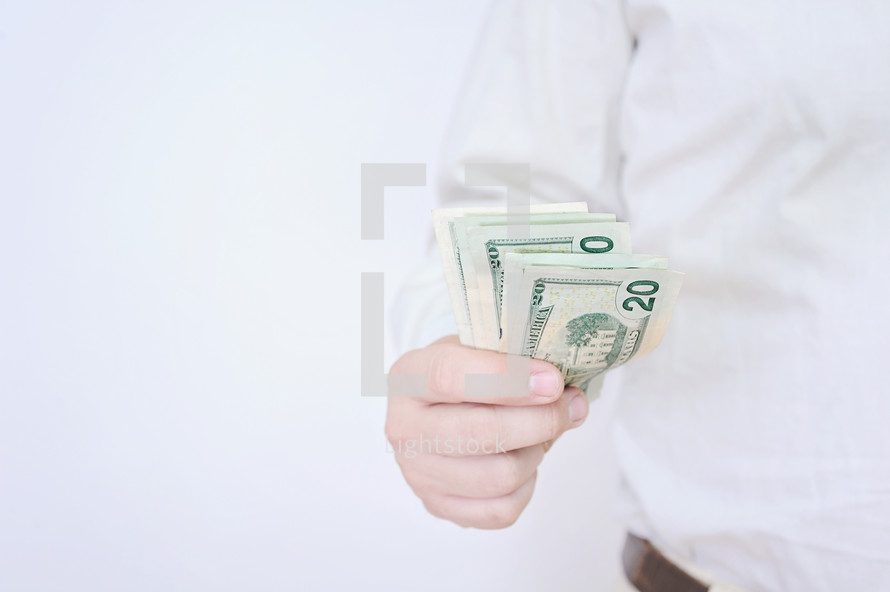 man with cash in his hand 