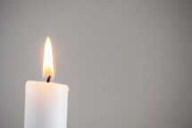 flame on a white candle 