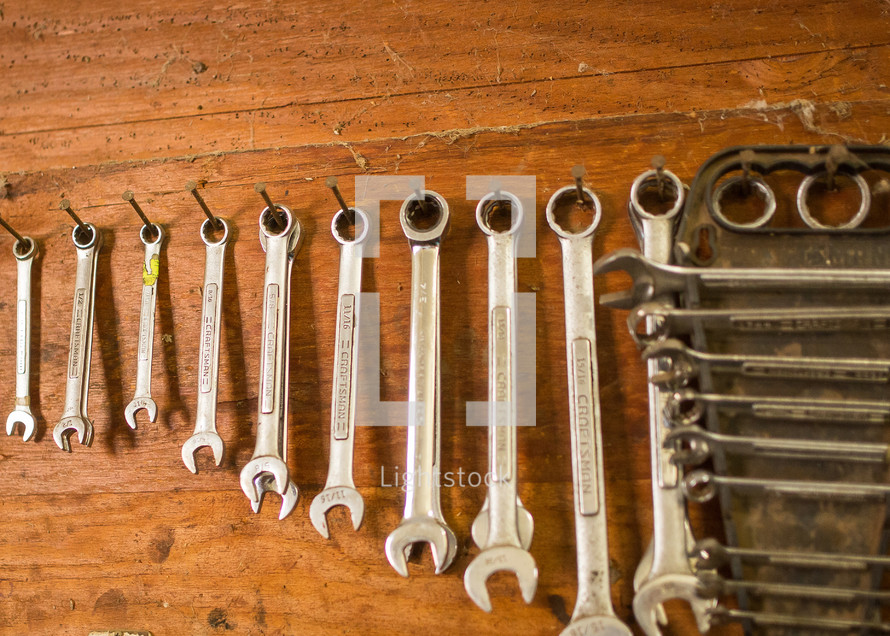row of hanging wrenches 