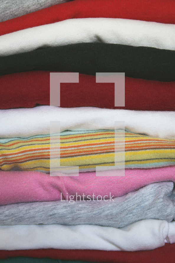 Stack of folded girls clothing