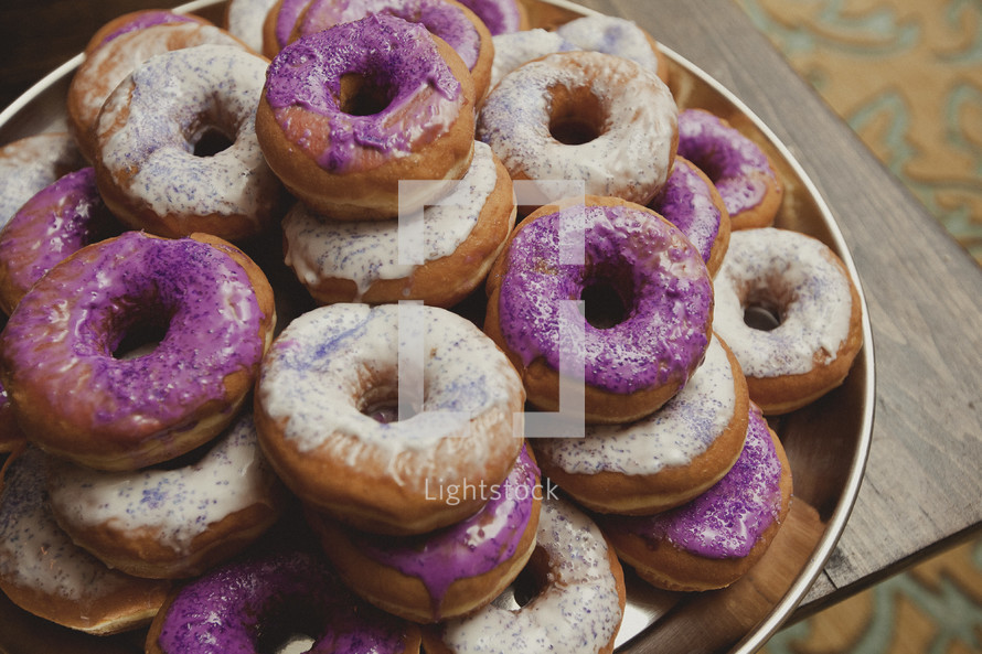 Glazed doughnuts with colored icing