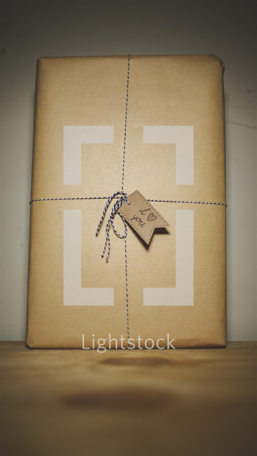 wrapped present in brown paper 