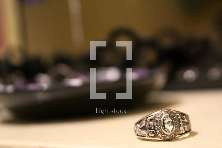 Class ring laying on a table