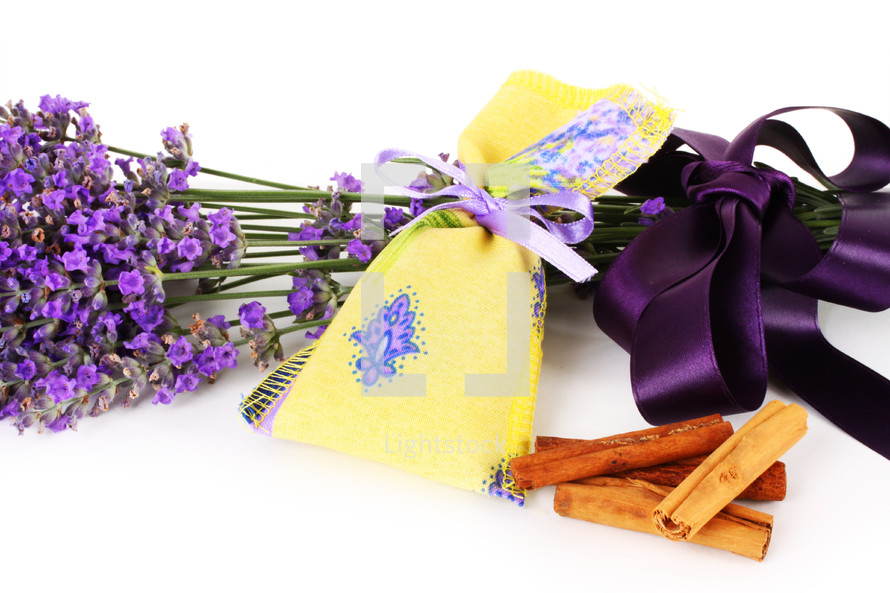 Lavender scented sachets on white background