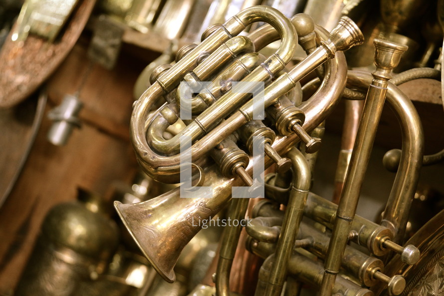 Brass trumpets in an antique musical instrument shop