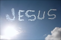 Jesus name written in the clouds