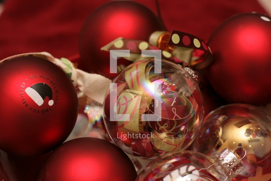 red and clear Christmas ornament balls