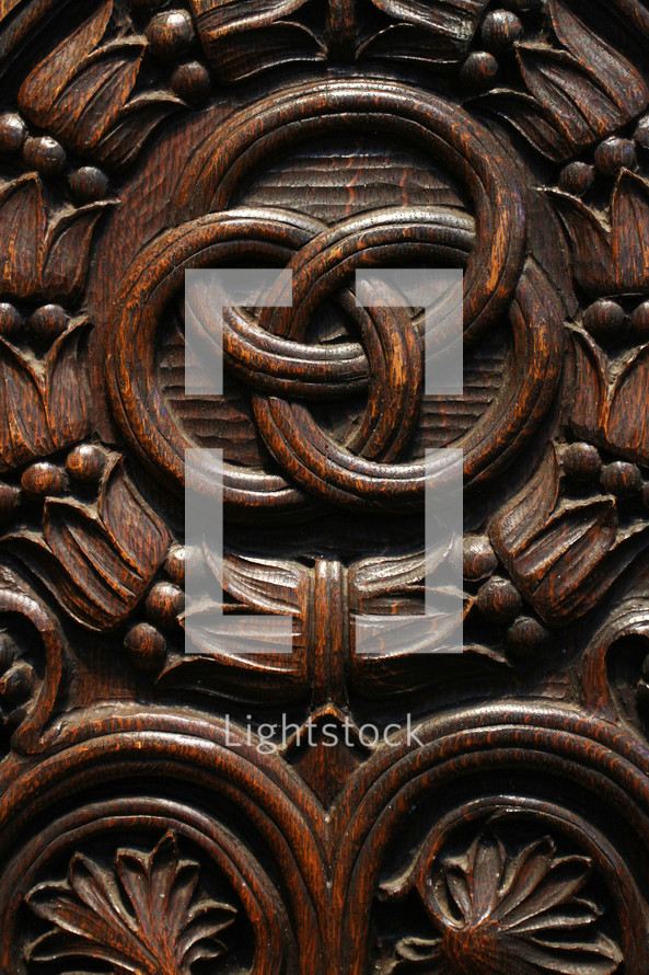 detail carved into a wood door