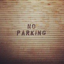no parking painted on a garage door