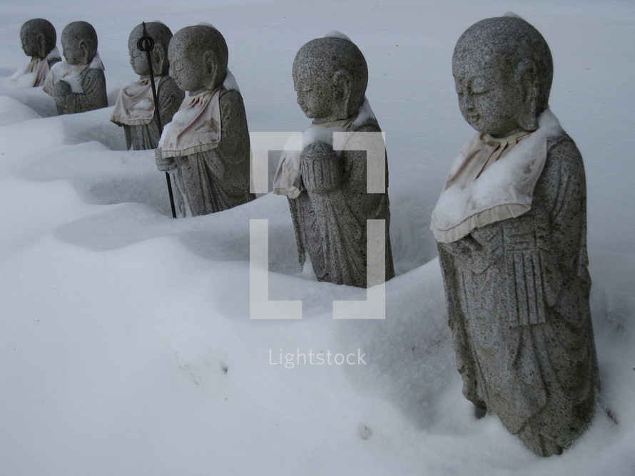 Hindu statues in snow 