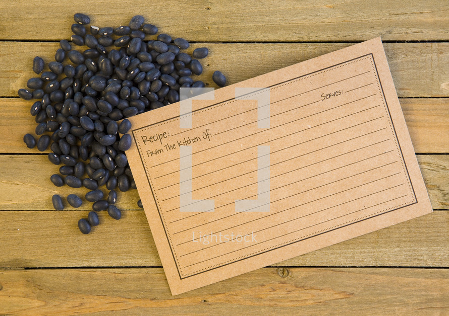 dried beans and a recipe card 