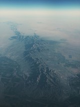 aerial view of mountains below 