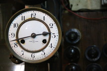 Antique wind up clock with ceramic face