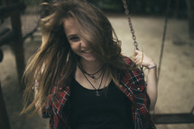 teen girl on a swing 