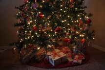 presents under a Christmas tree