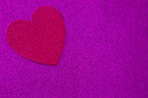 fuchsia heart cutout on purple 