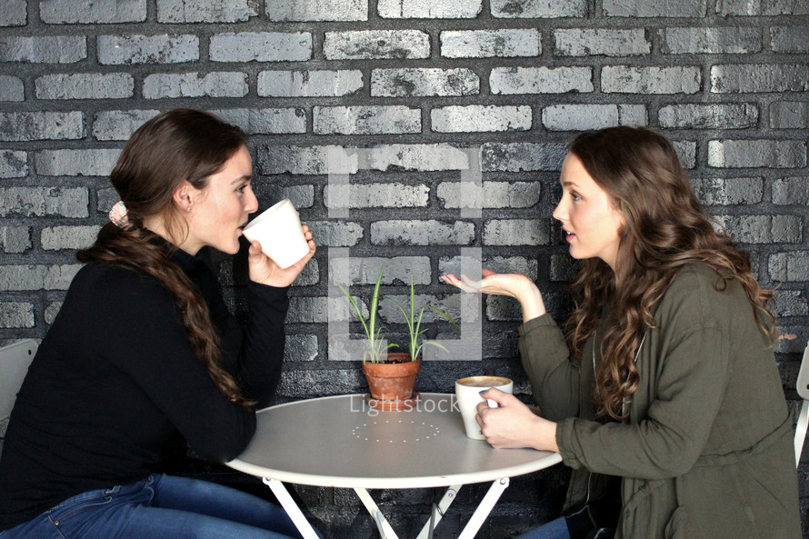 friends talking over coffee 