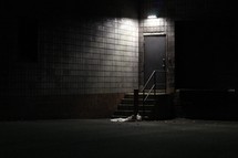 light over a back door at night