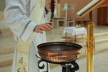 priest at baptism 