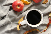 apples, fall leaves, and coffee cup 