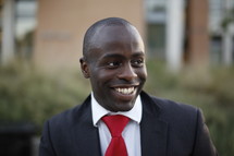 smiling African-American man in a suit 