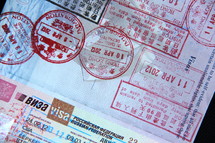 Visa stamps in a passport 