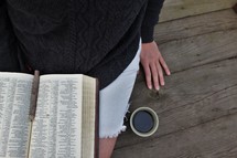 Bible in a woman's lap 