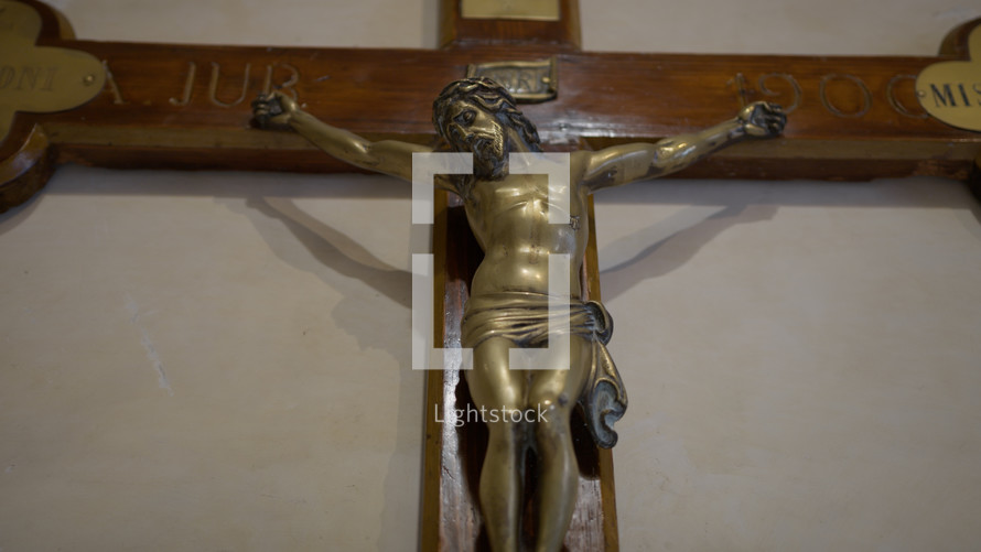Ancient handmade crucifix in a Church in Italy 