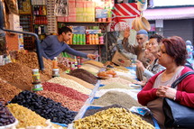 Locals shopping at a farmer's market.