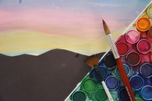 art supplies on a pastel background 
