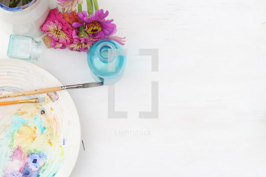 watercolor on a plate, paint brushes, pastels, flowers, house plant, teal, glass, art, background 