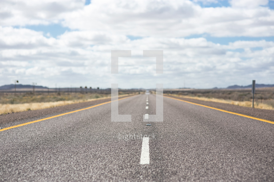 A highway through a barren desert.