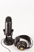 microphone and headphones on a white background 