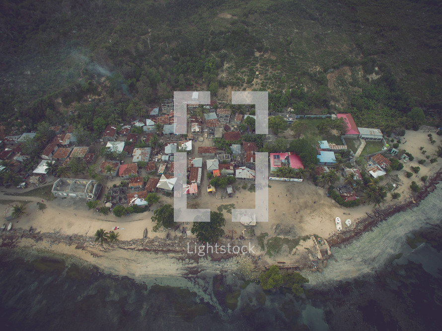 aerial view over homes on an island 