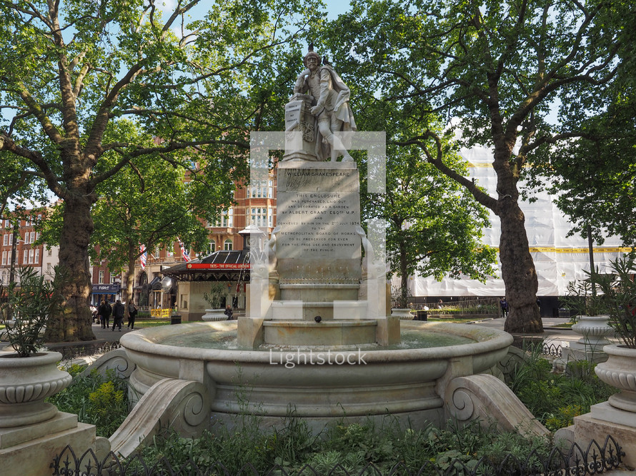 LONDON, UK - JUNE 10, 2015: Statue of William Shakespeare built in 1874 in Leicester Square