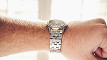 a man's wrist watch 