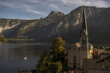 church overlooking a lake 