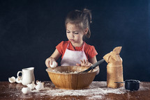 girl baking in a kitchen 