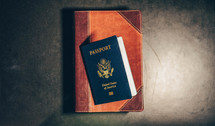 passport and leather bound Bible 