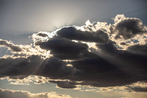 sunbeams through clouds 