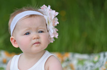 toddler girl with a flower headband