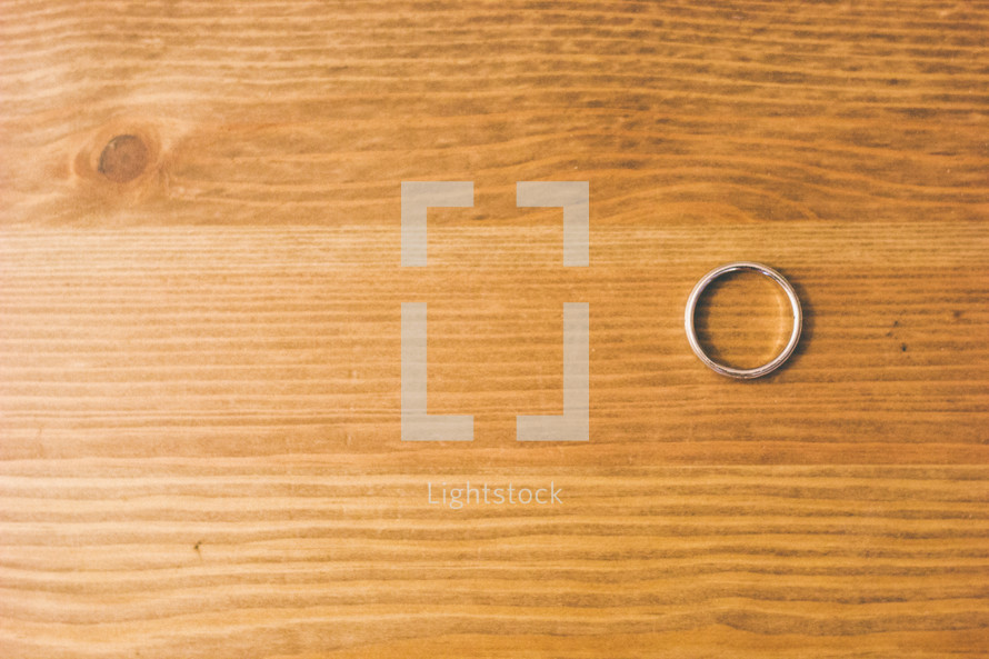 Ring on a wooden table.