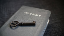 a key on a Bible 