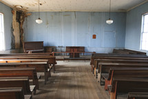 empty pews in an old church 