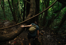 a woman hiking through the jungles 